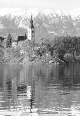 The island, topped by the Church of the Assumption, on Lake Bled.
