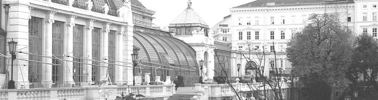 A view of the Palmenhaus in Burggarten with the Albertina in the background.