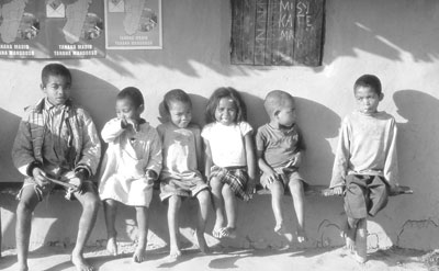 Children in a rural village hang out after school.