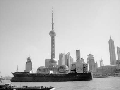 The modernist skyline of Pudong is fully experienced while cruising on the Huangpu River.
