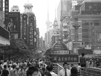 Typical street in Shanghai with the Oriental Pearl Tower in the background. Photos: Joseph