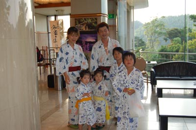 A family wearing yukatas at Hotel Toba Senpokaku in Mei Prefecture.