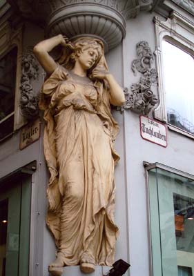 One of the many figures that can be found 'holding up' doorways and windows all over Vienna.