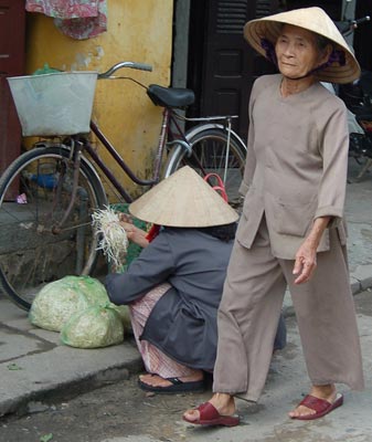 Traditionally dressed women at Hoi An's market.