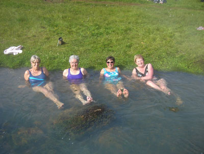 American and Icelandic hikers (left to right: Jónína, Leslie, Doris and Stönka) enjoying a soak in a hot spring along our route.