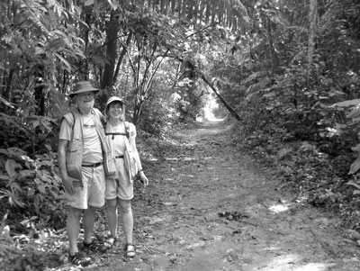 Jerry and Nili on the hiking path at Jaguar Preserve — Dangriga.