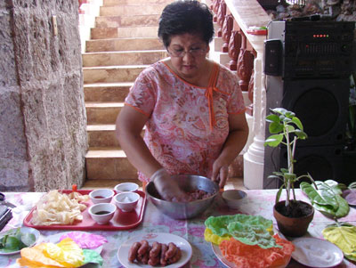 Milada Valde mixing the Lucban longganisa ingredients. Photos: Scott