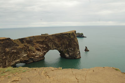 Dyrhólaey Arch, located on the southernmost point of Iceland.