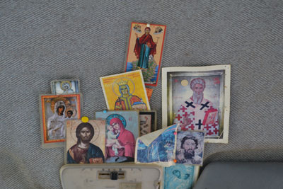 A collection of cards tucked into the visor of a bus that was shuttling pilgrims between monasteries.