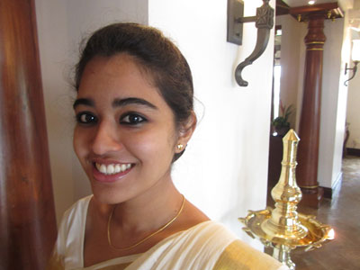 Smiling hostess at the Vivanta by Taj Malabar.