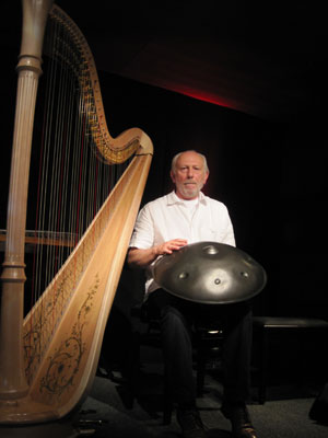 Harpist Luc Vanlaere, with a hang in his lap, in Bruges, Belgium.  Photos: Nancy Norberg