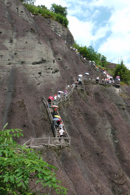 Visitors climbing up Wuyi Shan.