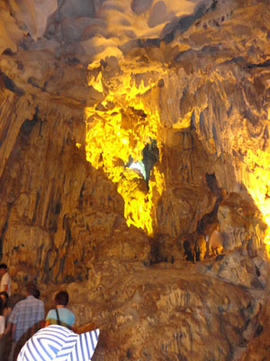 Inside Sung Sot Cave on Bo Hon Island, focused lighting highights areas of interest. Photo by Colin Brodie