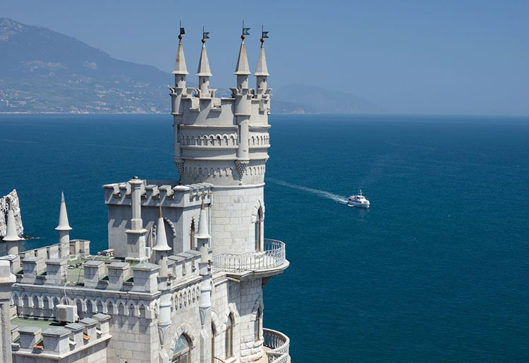 Swallow’s Nest, a castle near Yalta in Crimea, Ukraine, was built on top of a 130-foot-high cliff overlooking the Black Sea. Photo ©mikekiev/123RF