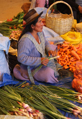 Selling vegetables at the Tarabuco Sunday market.