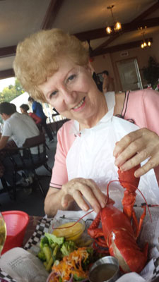 Emilee Hines enjoying a lobster meal.