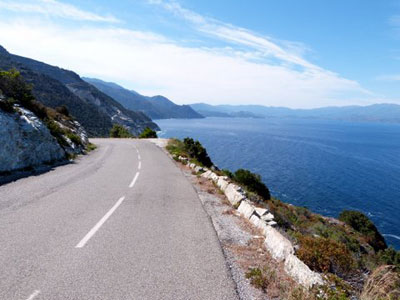 Highway D80 along the Corsican coast lacks bike lanes and guard rails.
