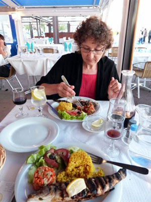 Lois enjoying a typical Corsican seafood dinner.
