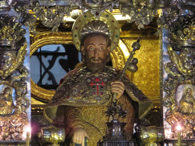 Pilgrims are invited to climb the stairs behind the altar and hug the gilded and jewel-encrusted statue of St. James (Santiago).