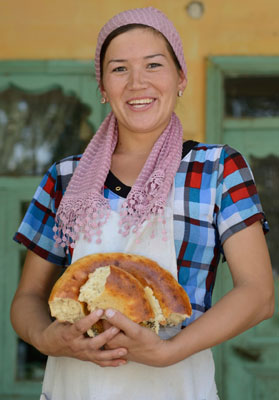 Waitress at a restaurant on the road to Ferghana, Uzbekistan.