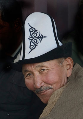 A gentleman at the Sunday Tolmak animal bazaar in Bishkek, Kyrgyzstan.