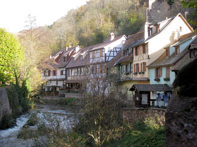 Buildings along the Weisbach River in Kaysersberg, France. Photo: Addison
