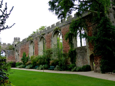 Walls of the ruined Great Hall frame the garden at the Bishop’s Palace. 