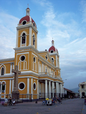 The neoclassic-style Cathedral of Granada straddles the eastern side of Parque Colón in Granada, Nicaragua.