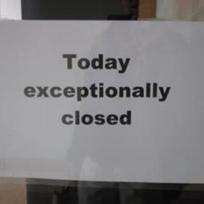 A sign in the window of a shop that was closed for Ascension Day in Brugge, Belgium. Photo: Anderson