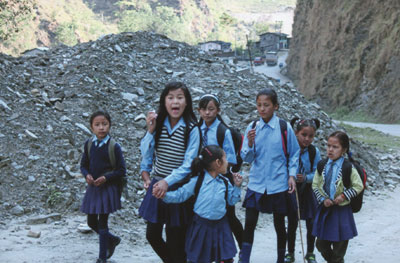 Schoolchildren also travel on the only road south of Kodari.