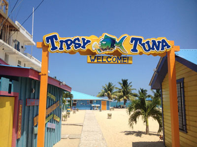 A sign marks the way to the Tipsy Tuna restaurant.