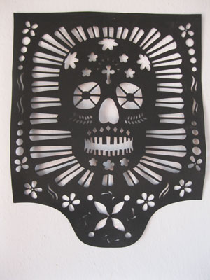 A Day of the Dead papel picado, or cut-paper decoration. 
