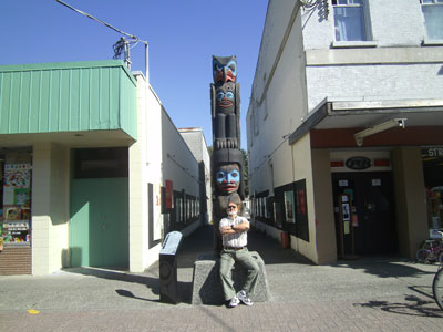 Marv in front of one of the many totems found in the city of Duncan.