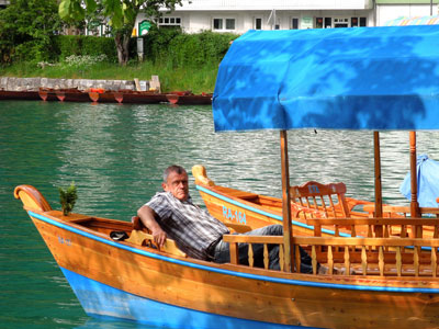 A man relaxing on Slovenia’s Lake Bled.