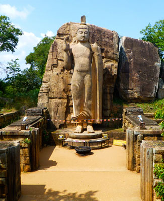 39-foot-tall rock-cut Aukana Buddha statue in Sri Lanka. Photo by Nili Olay