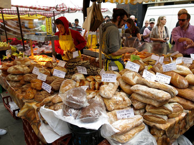 Bread vendor at the Saturday Portobello Market in Notting Hill.
