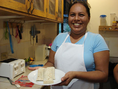 Chef Lorena Alvarez with burritos.Photos by Sandra Scott 