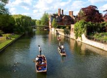 One of the best ways to see the University of Cambridge is by punting on the River Cam. Photo by Cameron Hewitt