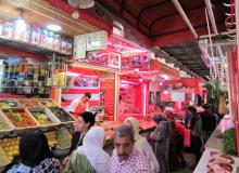 People shopping for food in Meknes' medina a few days before the start of Ramadan. Photo by Stephen Addison