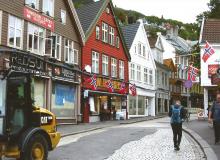 Colorful buildings line a street in Bergen, Norway.