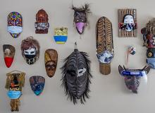 A few of my souvenir masks, now wearing masks, collected worldwide. Photos by Donna Judd