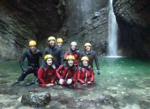Joanne Kuzma (front center) and group canyoning in Slovenia.