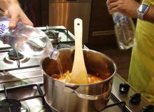 Adding water to the simmering Hungarian Goulash. Photos by Sandra Scott