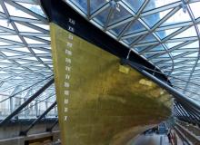 Visitors to the ‘Cutty Sark’ in London’s Greenwich district can walk under the ship, which has been raised 11 feet above her dry dock. Photo by Gretchen Strauch