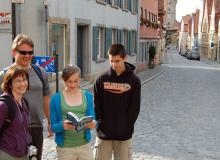 Let your teens lead the way sometimes, like this young traveler in Rothenburg, Germany. Photo by Rick Steves 