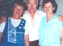 Researcher Dezso and his wife, Kinga (left), with Norine Matteson.