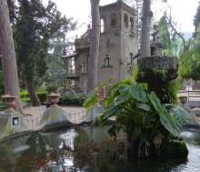 With a Victorian folly in the background, this pond is centered with a tropical plant in the garden Hallington Siculo — Taormina, Sicily. Photos by Yvonne Michie Horn