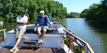 Randy Keck (at right) enjoying the good life with a fellow passenger from Australia, barging on the Canal du Midi in southwest France in spring 2015.