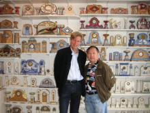 Selliers and visitor Lawrence Peacock in front of a selection of Jacques’ clocks