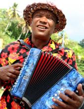 An accordion player welcomes Noordam passengers to the port of Samaná, Domincan 